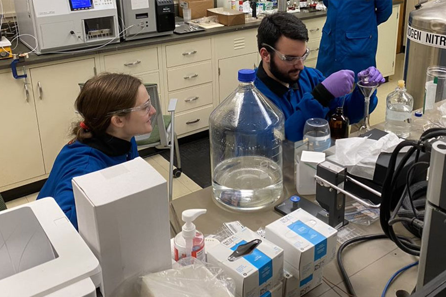 Students in a lab working with chemicals