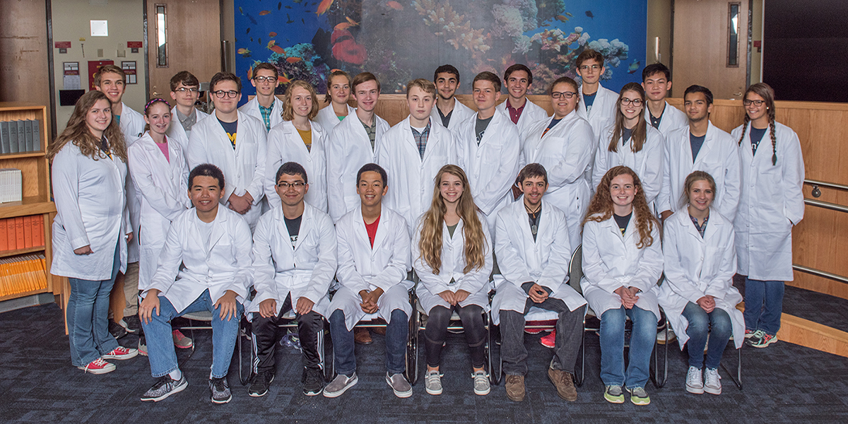 Group of students in lab coats