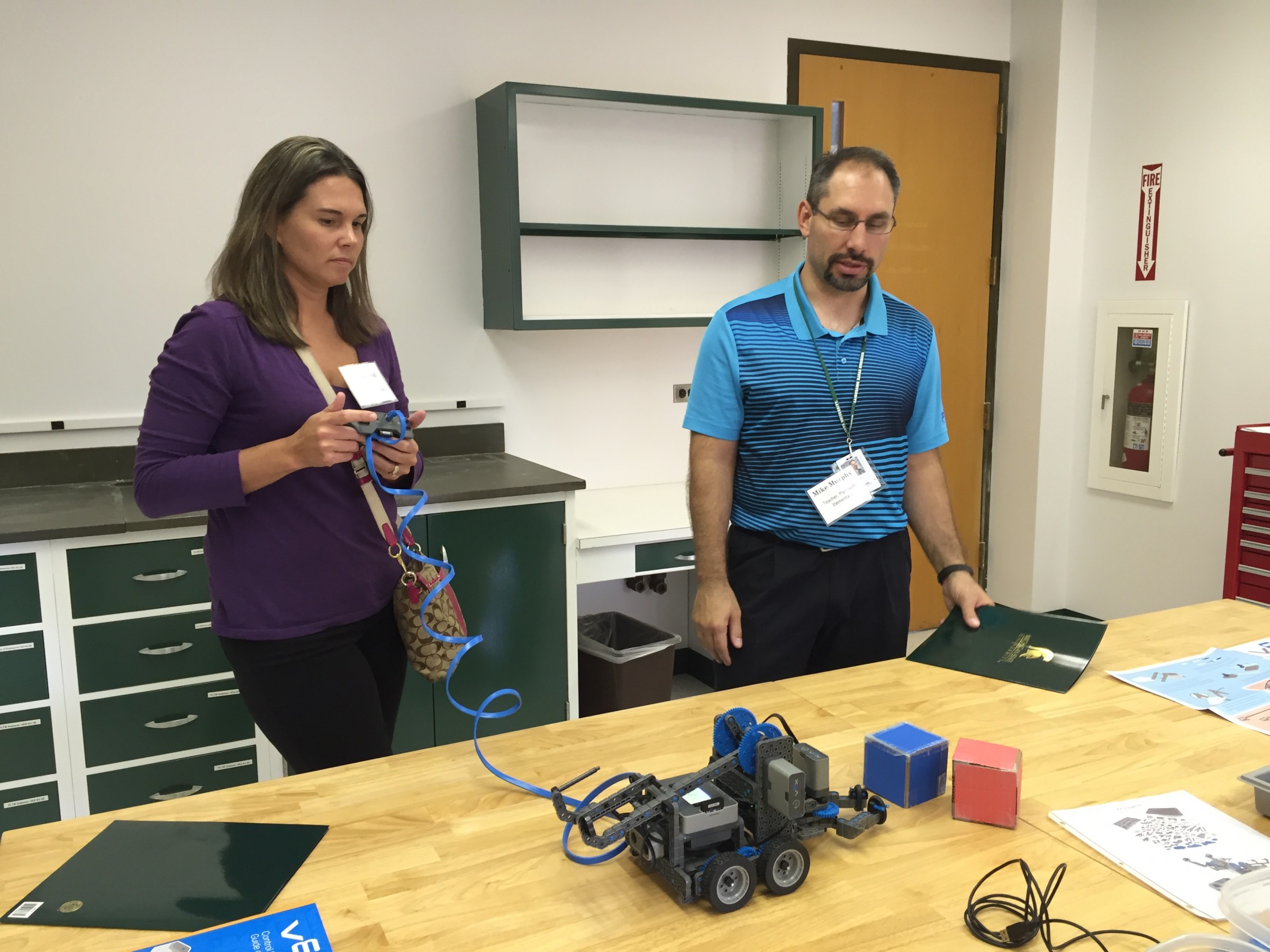 Two teachers working on 3D printing project