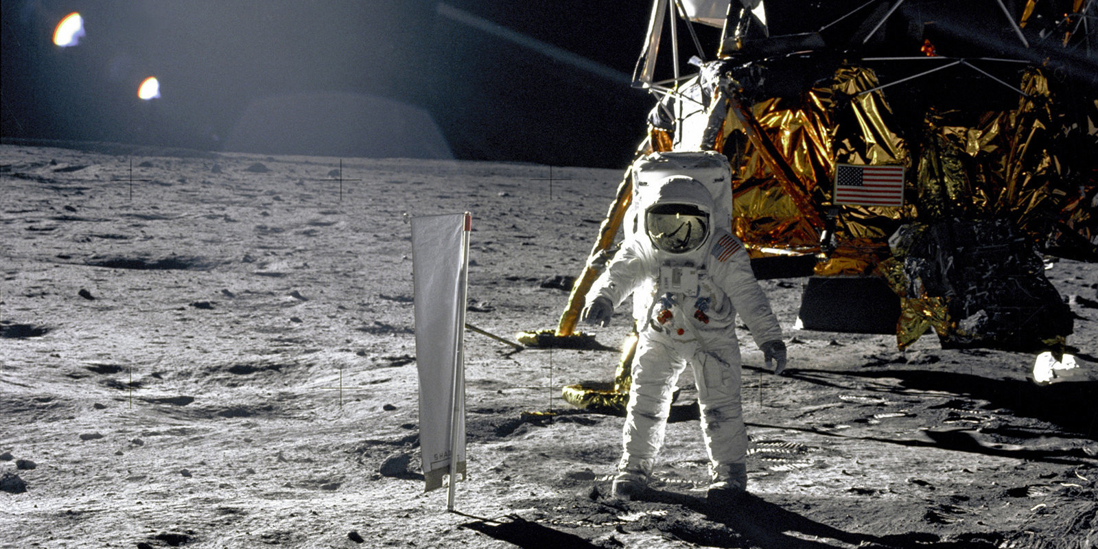 Image of astronaut on moon with landing equipment behind him from 1969 Apollo 11 mission